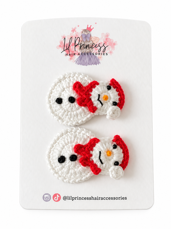 Crochet Snowman Christmas Hair Clips shown together