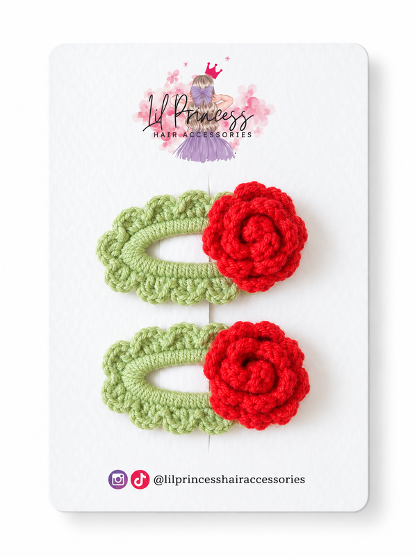 Red version of Green Crochet Rose Hair Clips in Red or Pink shown together
